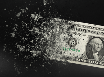 Disappearing dollar bill, representing inflation